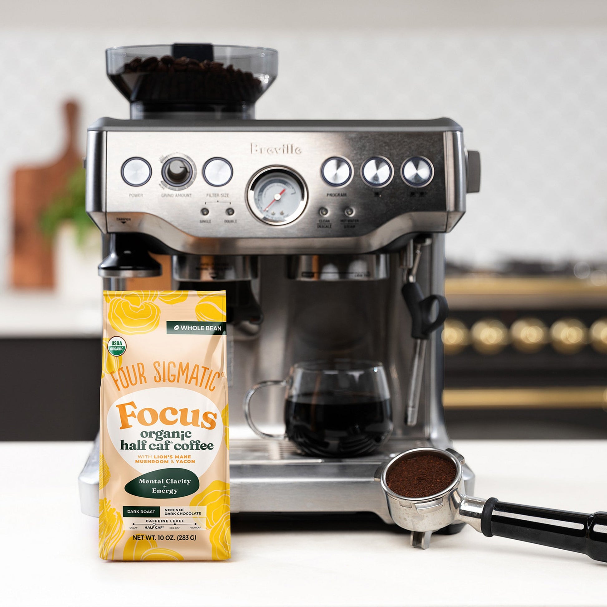 focus-half-caf-whole-bean-coffee-y4 Focus_Org_Dark_Roast_High_Caf_Kitchen_Pour_Woman_4_47b71a0c-c7fc-40fd-a2bc-fa7389dfb410.jpg